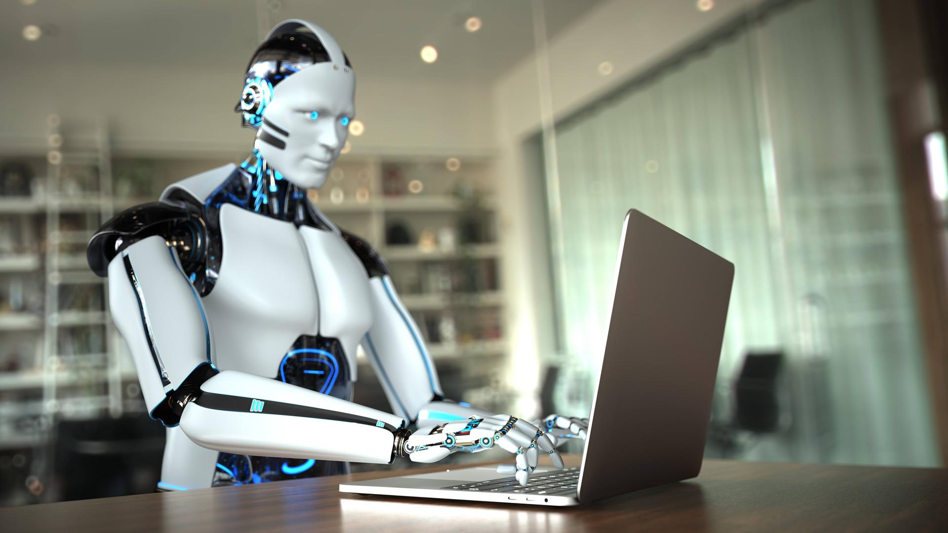 Das Bild zeigt eine 3D-Illustration eines Roboters, der auf einem Laptop schreibt. Der Roboter sitzt in einem Büro an einem Schreibtisch. Es handelt sich nicht um einen realen Roboter sondern um eine Visualisierung. 