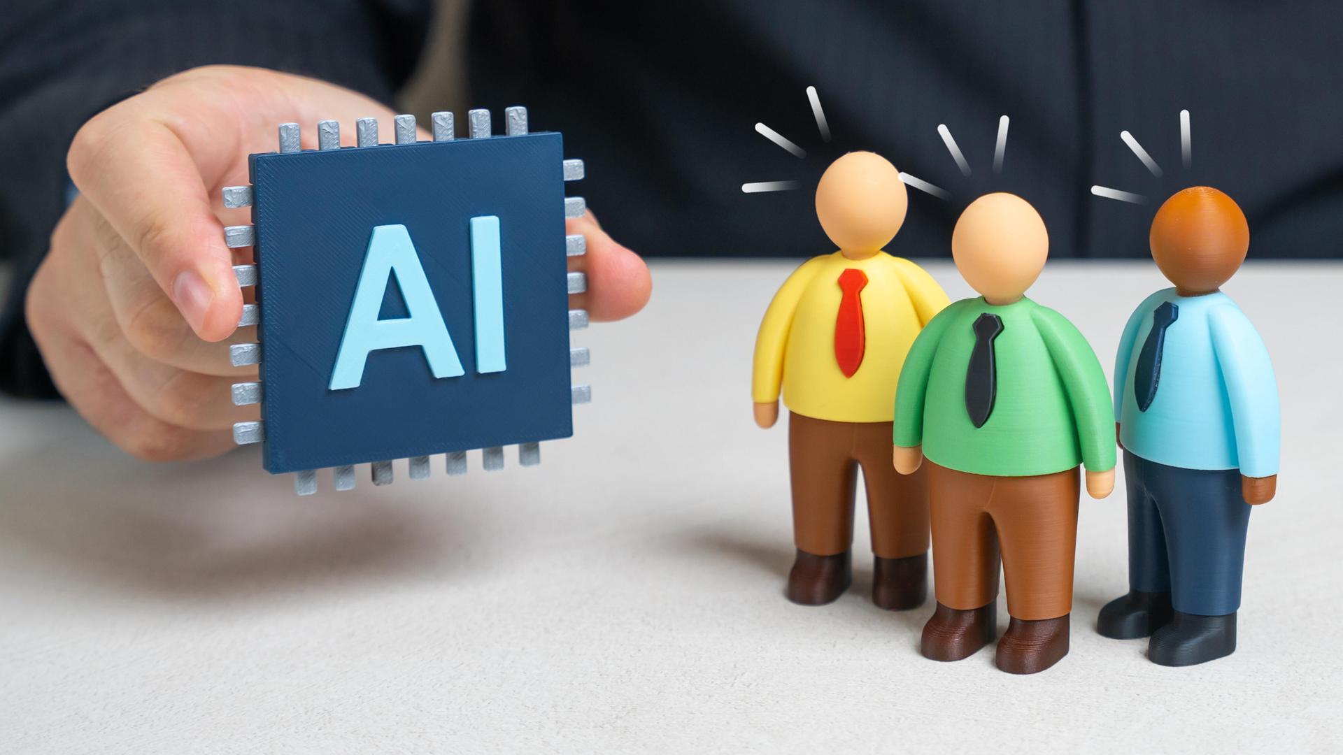 Drei bunt angezogene Figuren geraten ins Schwitzen, weil ihnen eine Hand einen Computerchip mit der Aufschrift "AI" (für Künstliche Intelligenz) zeigt.