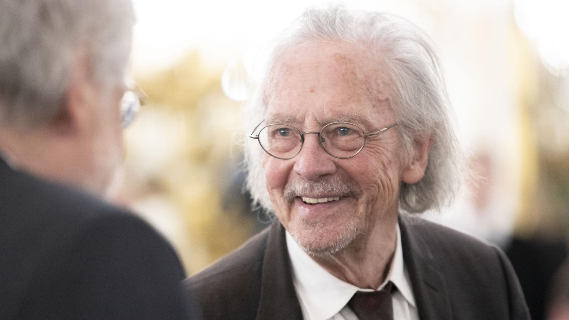 Nobelpreisträger Peter Handke lächelnd am 22. Februar 2024 in Wien