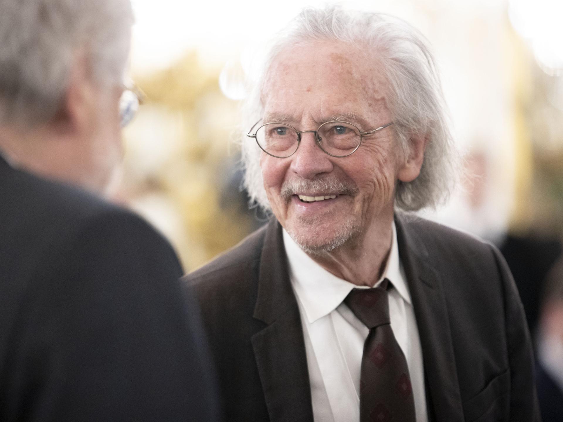 Nobelpreisträger Peter Handke lächelnd am 22. Februar 2024 in Wien