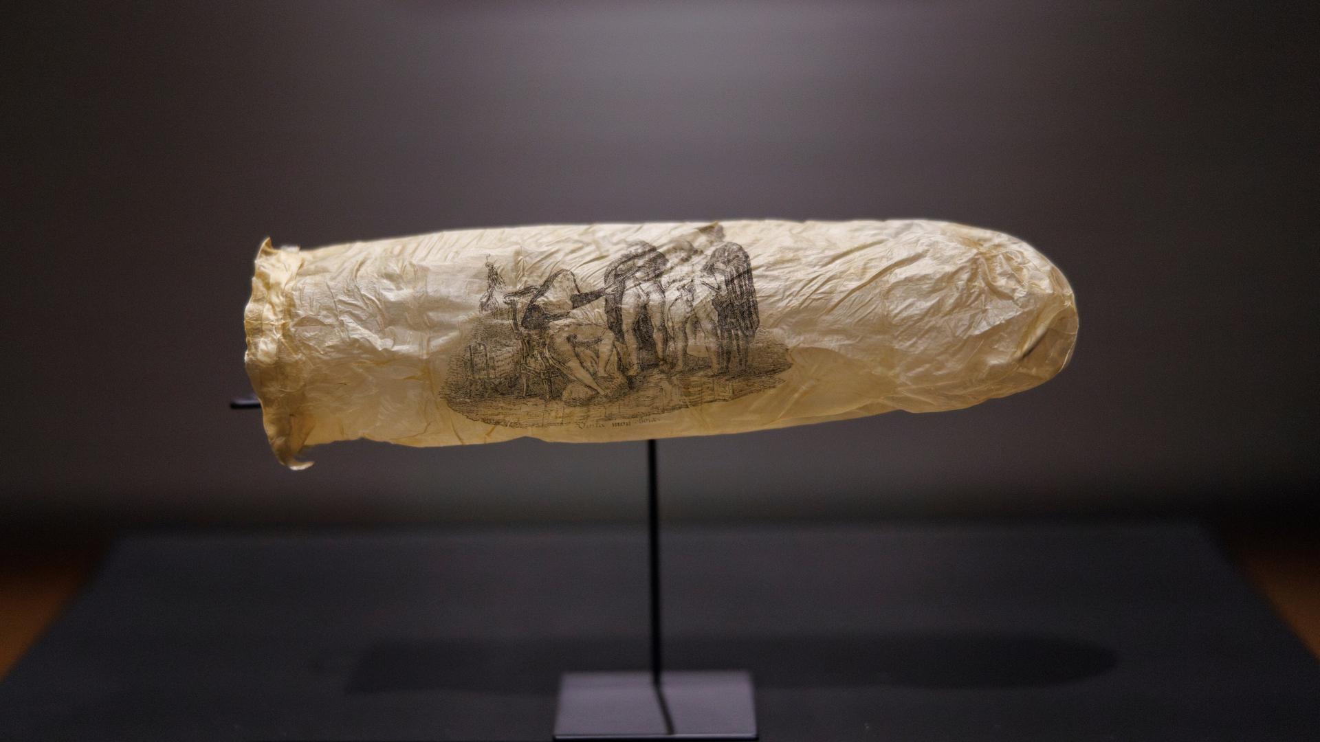 EDS NOTE: NUDITY - This image made available by the Rijksmueum shows a condom with print, circa 1830, which has gone on display at Amsterdam's Rijksmuseum. (Kelly Schenk/Rijksmuseum via AP) EDS NOTE: NUDITY - This image made available by the Rijksmueum shows a condom with print, circa 1830, which has gone on display at Amsterdam's Rijksmuseum. (Kelly Schenk/Rijksmuseum via AP)