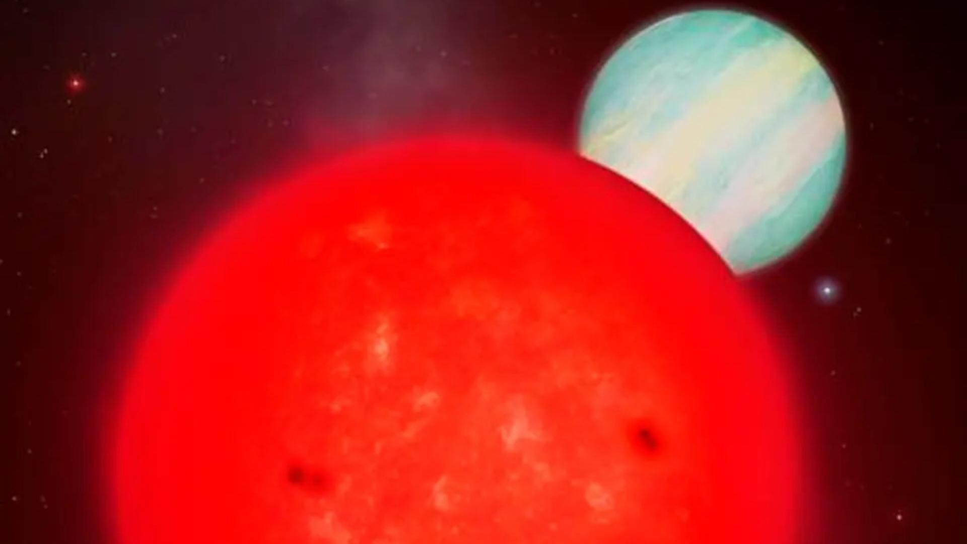 Künstlerische Darstellung des Riesenplaneten (weiß), der im Löwen einen Roten Zwergstern umkreist. Künstlerische Darstellung des Riesenplaneten (weiß), der im Löwen einen Roten Zwergstern umkreist.