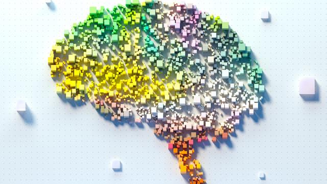 Illustration eines Gehirns vor hellem Hintergrund, dass aus vielen klienen farbigen Quadraten besteht.