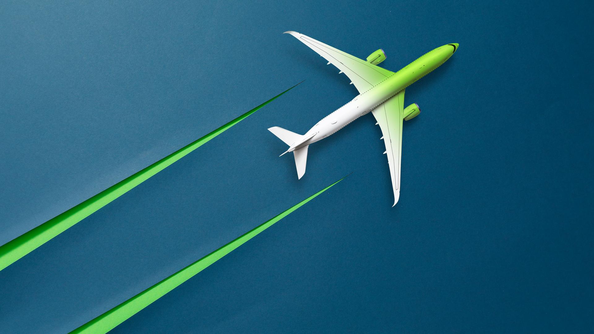 Illustration: Grün-weißes Flugzeug mit grünen Kondensstreifen in Form eines ausgeschnittenen Kartons.
