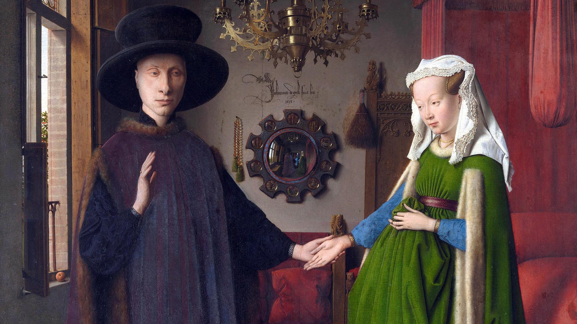 Gemälde mit dem Titel „Das Arnolfini-Porträt“, 1434 gemalt von Jan van Eyck (1390-1441). Das berühmte Gemälde ist auch bekannt als „Die Arnolfini-Hochzeit“, National Gallery London.