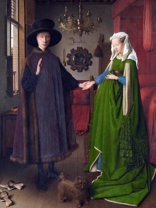 Gemälde mit dem Titel „Das Arnolfini-Porträt“, 1434 gemalt von Jan van Eyck (1390-1441). Das berühmte Gemälde ist auch bekannt als „Die Arnolfini-Hochzeit“, National Gallery London.