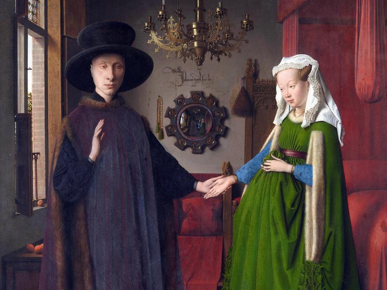 Gemälde mit dem Titel „Das Arnolfini-Porträt“, 1434 gemalt von Jan van Eyck (1390-1441). Das berühmte Gemälde ist auch bekannt als „Die Arnolfini-Hochzeit“, National Gallery London.