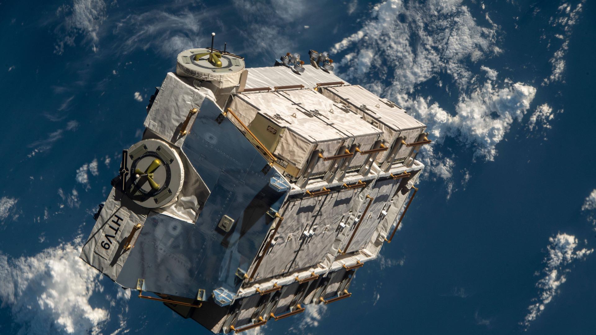 March 11, 2021 - Earth Atmosphere - An external pallet packed with old nickel-hydrogen batteries is pictured shortly after mission controllers in Houston commanded the Canadarm2 robotic arm to release it into space. The International Space Station was orbiting 260 miles above the Pacific Ocean west of central America at the time this photograph was taken. The external pallet will orbit Earth between two to four years before burning up harmlessly in the atmosphere. The batteries were removed during previous spacewalks and replaced with newer lithium-ion batteries to continue powering the station s systems. Earth Atmosphere - ZUMAz03_ 20210311_sha_z03_194 Copyright: xNASAx 