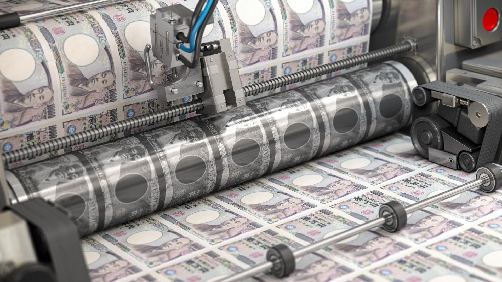 Eine Maschine druckt japanische Geldscheine.