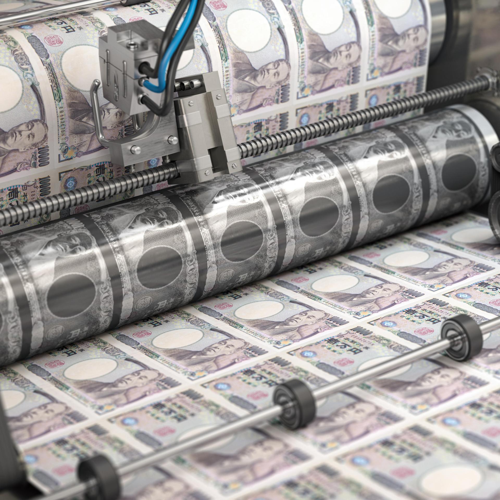 Eine Maschine druckt japanische Geldscheine.