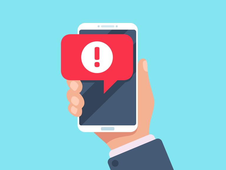 Illustration eines Smartphones mit Alarmmeldung.