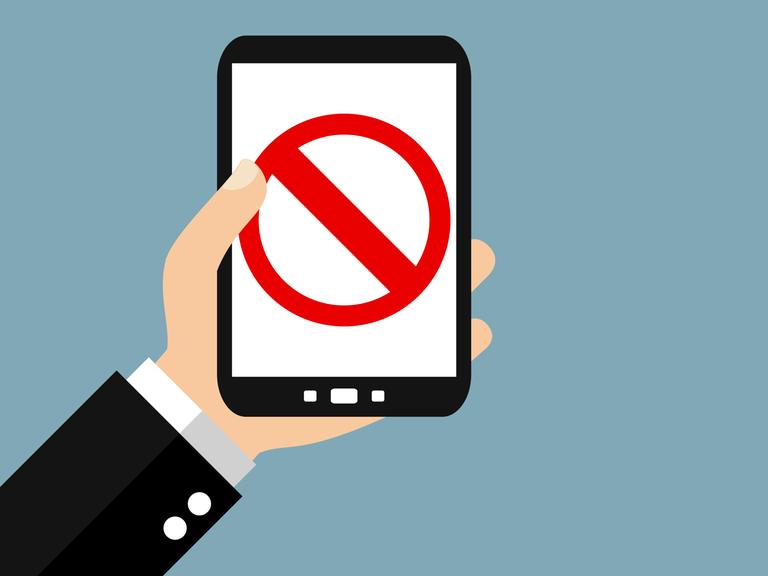 Blocked or illegal content on smartphone - Flat Design banner, Hand holding smartphone - Forbidden, No Access or Illegal Content, Hand holding smartphone - Forbidden, No Access or Illegal Content, 03.02.2022, Copyright: xkeportx Panthermedia31102163.jpg