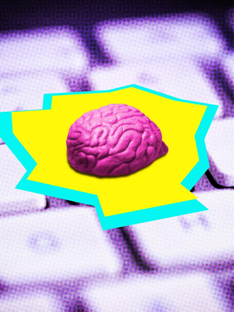 Fotomontage von einem Gehirn, das auf einer Computertastatur zwischen den Buchstaben K und I liegt.