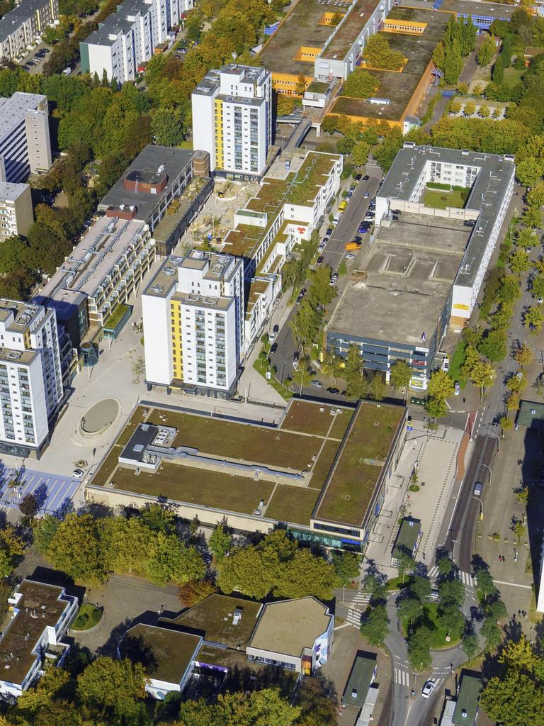 Luftbildaufnahme der Großwohnsiedlung Mümmelmannsberg in Hamburg mit mehreren Wohnblocks