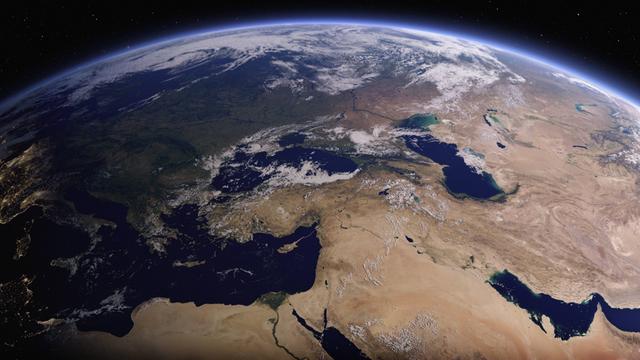 Digital bearbeitetes Bild der Erde aus dem Weltall mit Nacht über Europa und Tag über Asien 