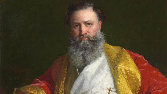 Ein Gemälde von Edward Harrison May zeigt Isaac Merrit Singer, der mit Vollbart und einem opulenten roten Mantel für den Maler posiert.
