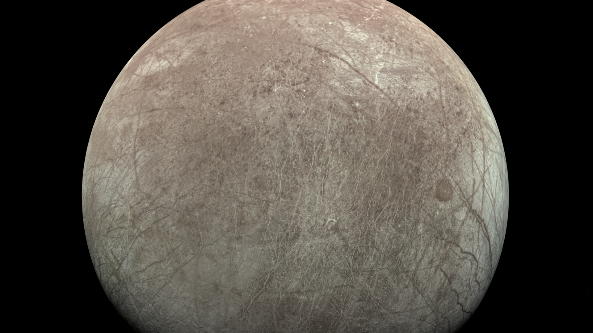 Unter dem von Rissen durchzogenen Eispanzer des Jupitermonds Europa gibt es einen gewaltigen Ozean. Die Oberfläche des Mondes wird oft durch hervorquellenden Eismatsch verändert, wie die wenigen Krater verraten Unter dem von Rissen durchzogenen Eispanzer des Jupitermonds Europa gibt es einen gewaltigen Ozean. Die Oberfläche des Mondes wird oft durch hervorquellenden Eismatsch verändert, wie die wenigen Krater verraten