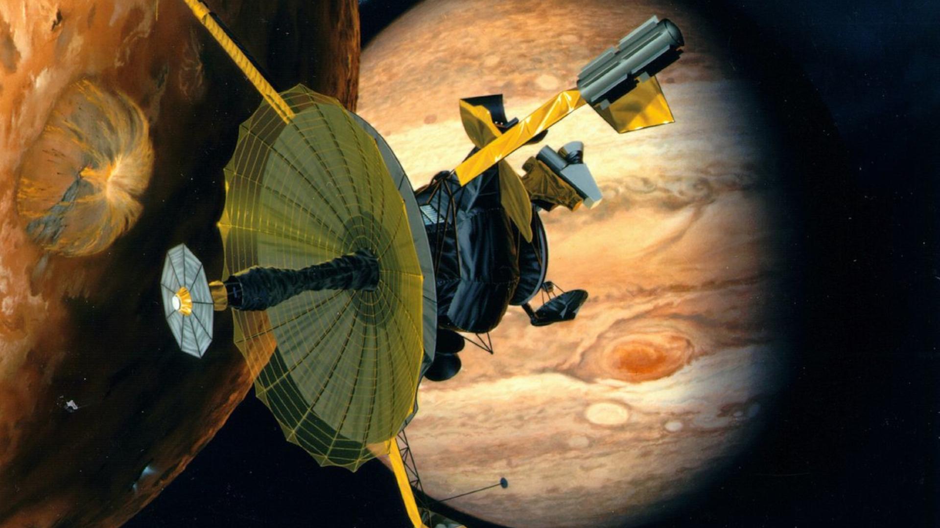 Ein Illustration zeigt die Raumsonde Galileo im Jupitersystem. Ein Illustration zeigt die Raumsonde Galileo im Jupitersystem.