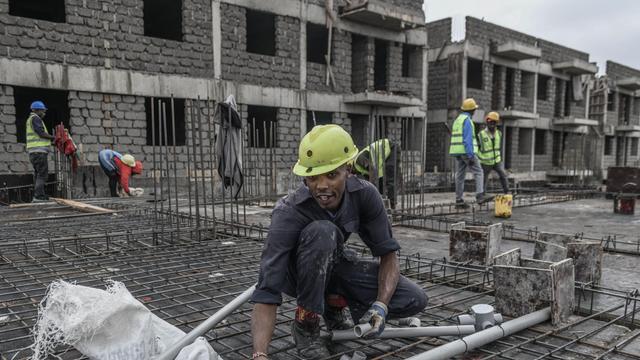 Das Foto zeigt Bauarbeiter auf einer Baustelle in dem afrikanischen Land Kenia. Gerald Anderson / Anadolu