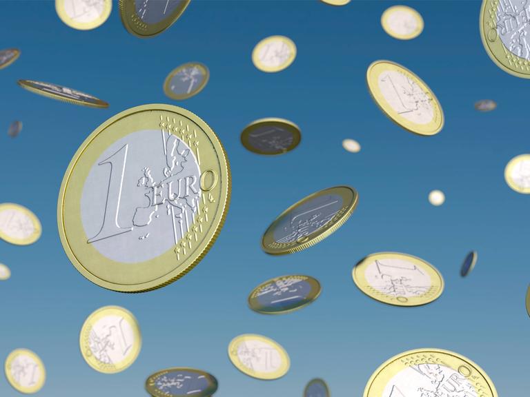1-Euro-Münzen fallen vom Himmel.