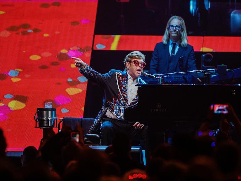 Elton John performs at the final leg of his 'Farewell Yellow Brick Road' tour in Stockholm, Saturday, July 8, 2023. (AP Photo/Caisa Rasmussen)