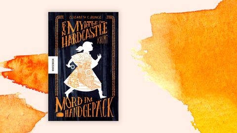 Das Buchcover von Elizabeth C. Bunces Krimi zeigt auf schwarzem Grund die weiße Silhouette eines Mädchens mit einer Lupe in der Hand. Hier ist das Cover hinterlegt mit orangen Aquarell-Tupfen.