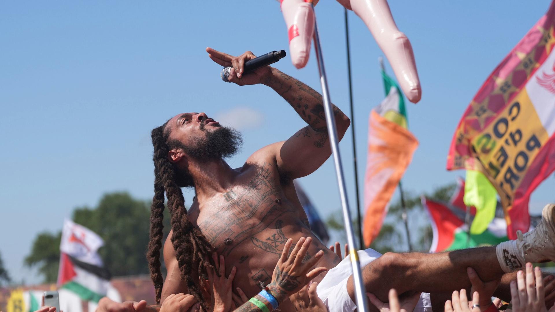 Bob Vylan performs on the West Holts Stage, during the Glastonbury Festival at Worthy Farm in Somerset. England, Saturday, June 28, 2025. (Yui Mok/PA via AP)