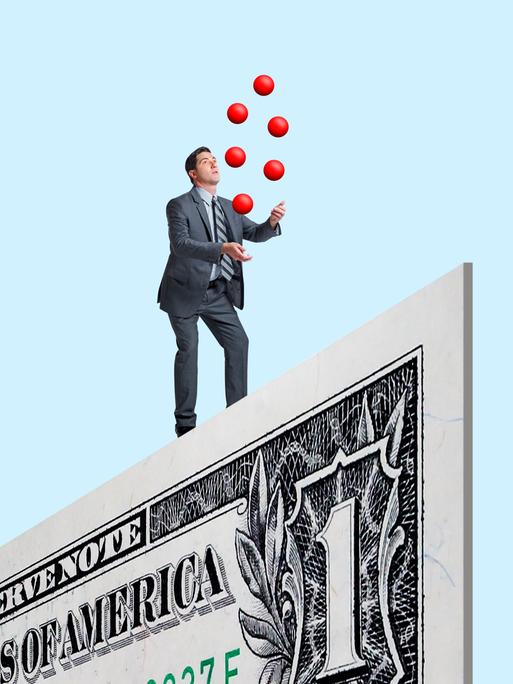 Illustration: Ein Mann im Anzug jongliert mit roten Bällen auf einer riesigen Dollarnote,