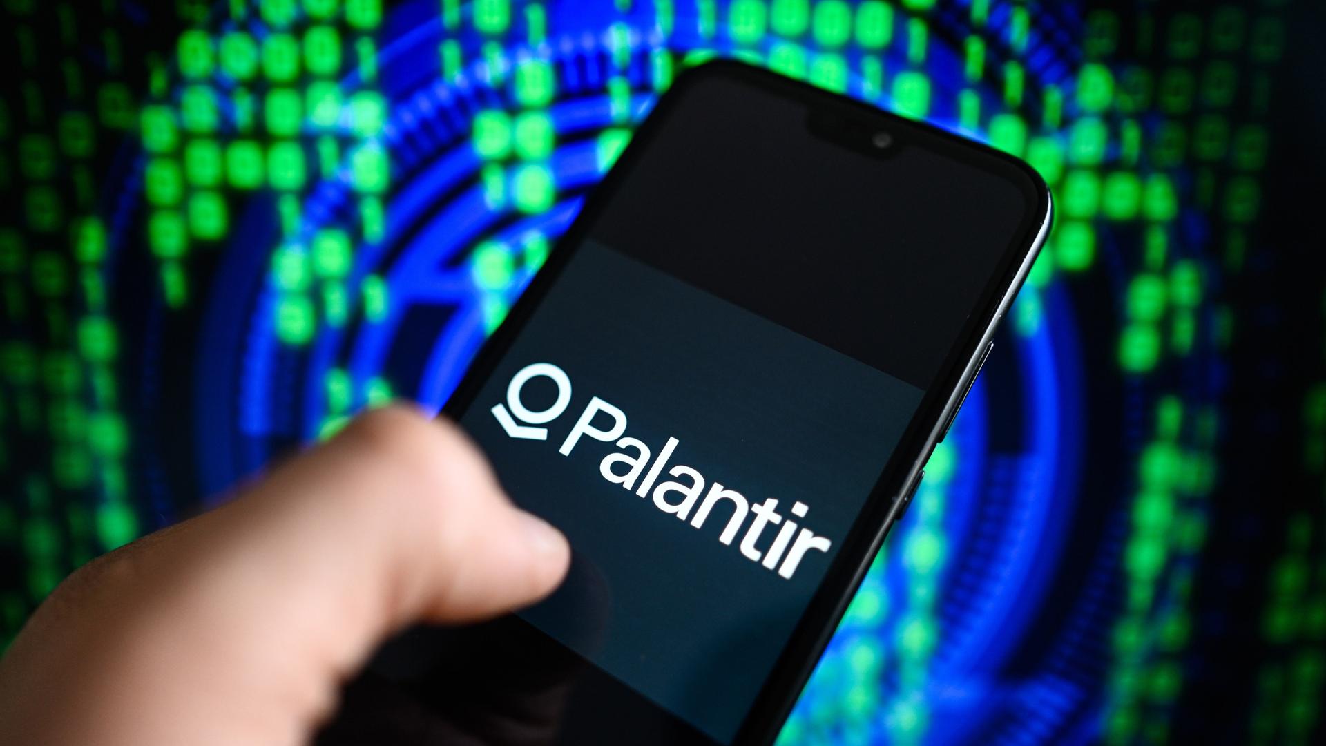 April 25, 2024, Poland: In this photo illustration the Palantir logo is displayed on a smartphone with coding on the background. (Credit Image: © Omar Marques/SOPA Images via ZUMA Press Wire April 25, 2024, Poland: In this photo illustration the Palantir logo is displayed on a smartphone with coding on the background. (Credit Image: © Omar Marques/SOPA Images via ZUMA Press Wire