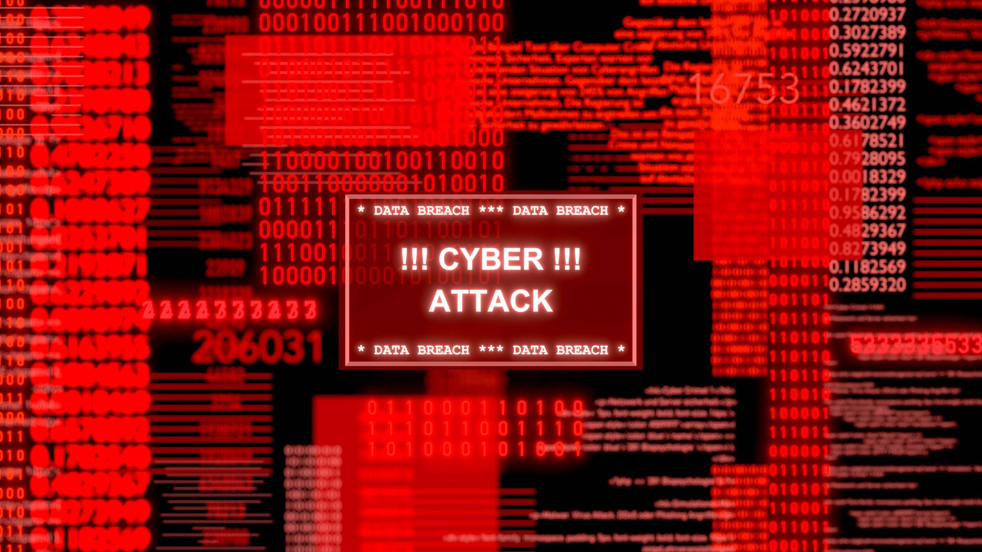 Roter Computerbildschirm mit Datencodes und einem Warnhinweis "Cyber Attack"