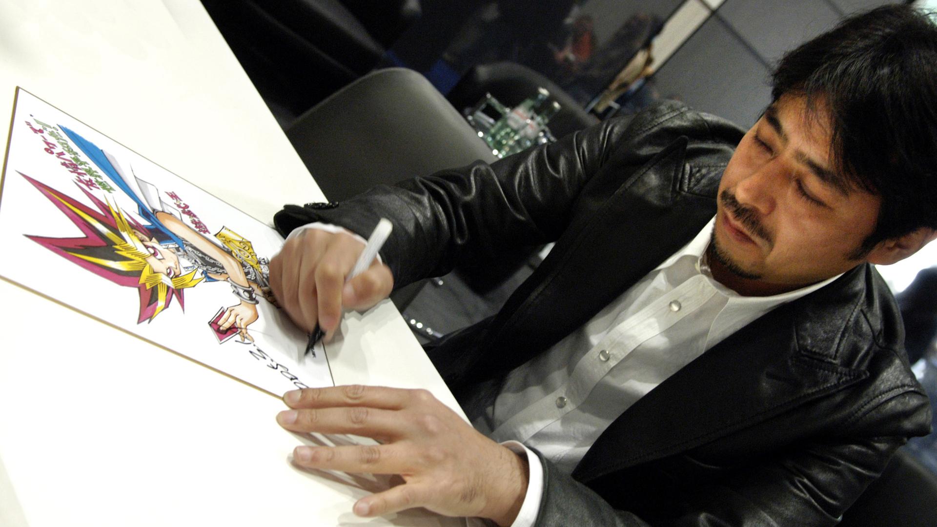 Comicautor Kazuki Takahashi zeichnet auf der Leipziger Buchmesse. Comicautor Kazuki Takahashi zeichnet auf der Leipziger Buchmesse.