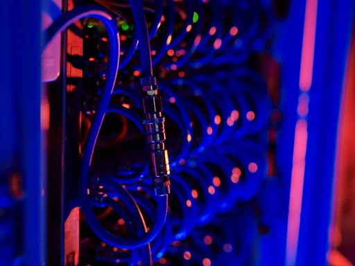 Computer cables attached together in server room property released