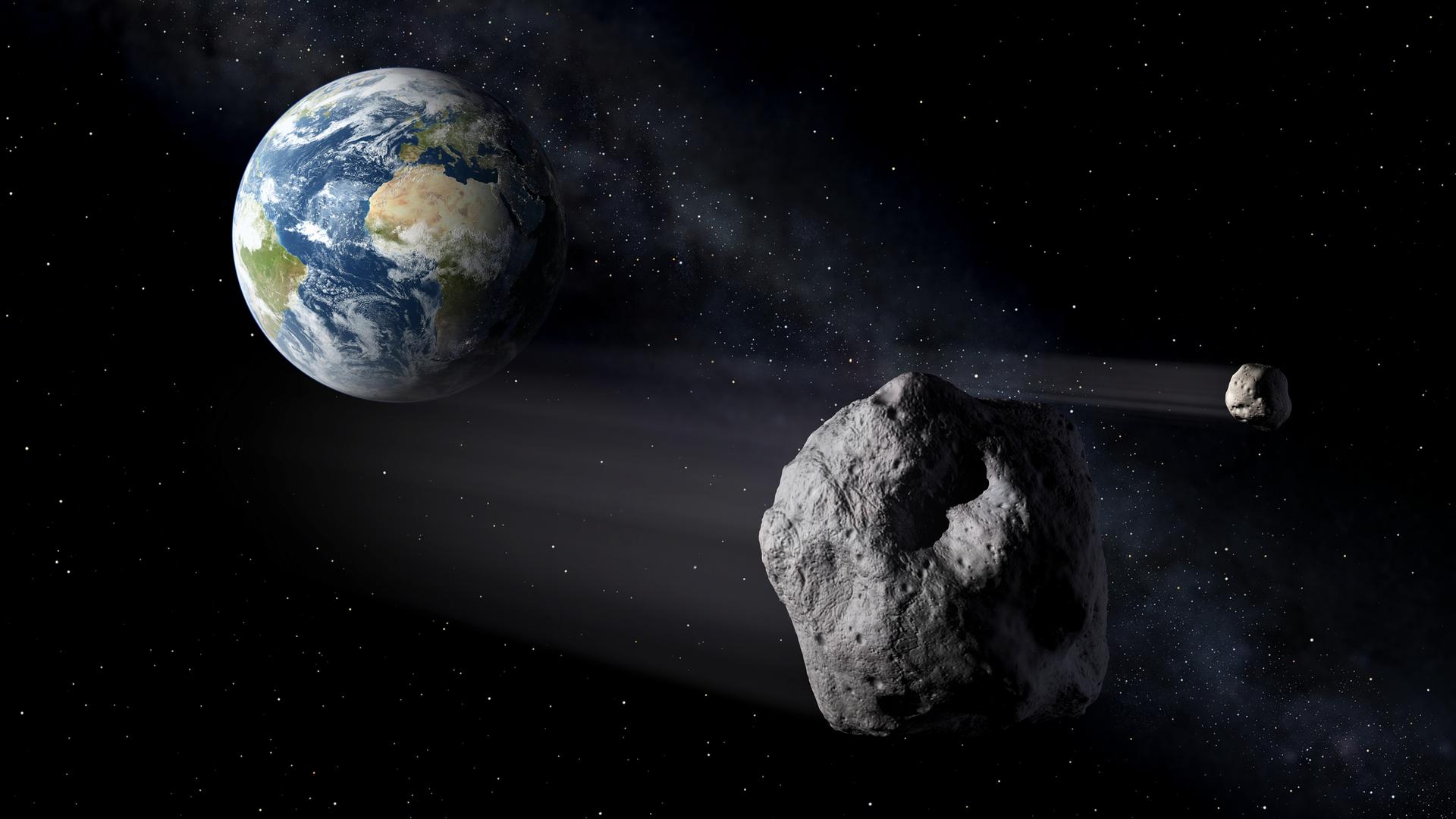 Ein Asteroid umkreist die Erde.