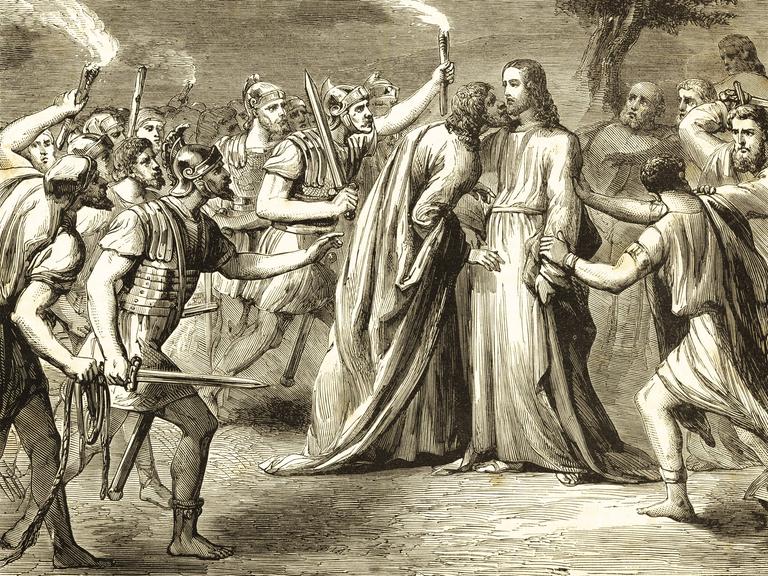 Man sieht eine Szene von Jesus umgeben von seinen Jüngern. Man sieht eine Szene von Jesus umgeben von seinen Jüngern.