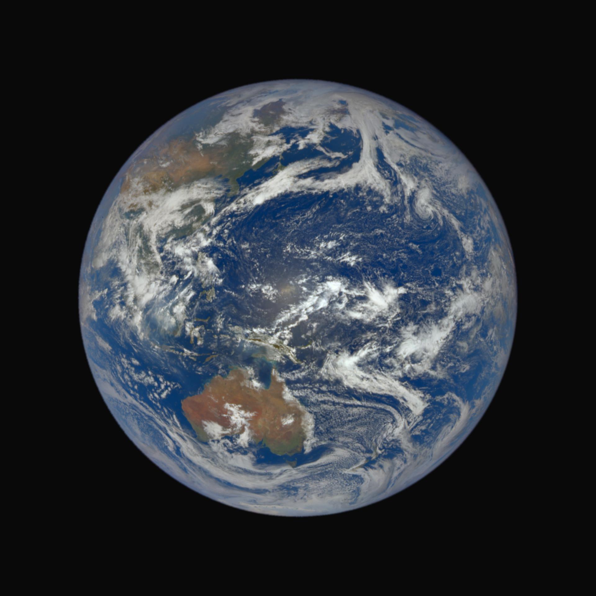Foto des blauen Planeten Erde vor schwarzem Hintergrund.