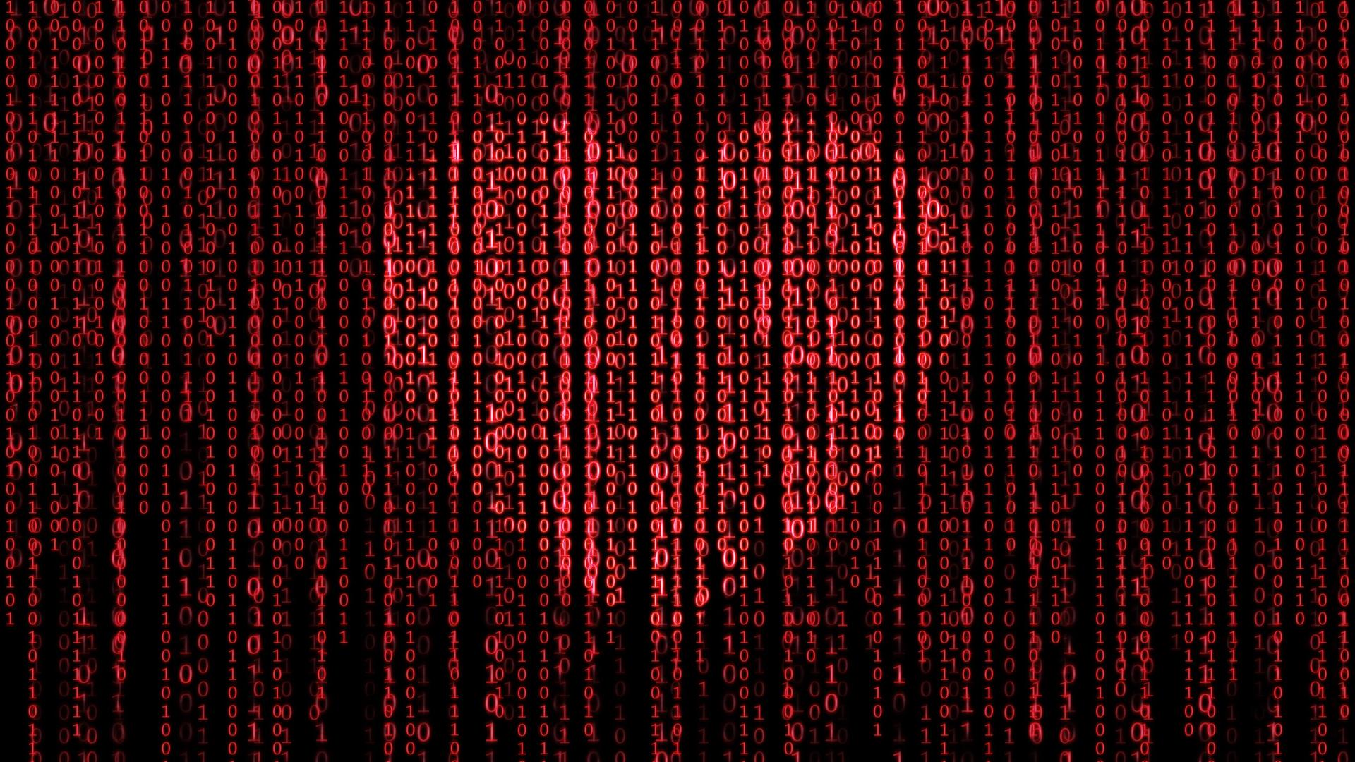 Aus einem roten Binärcode auf schwarzem Grund leuchtet ein Herz heraus