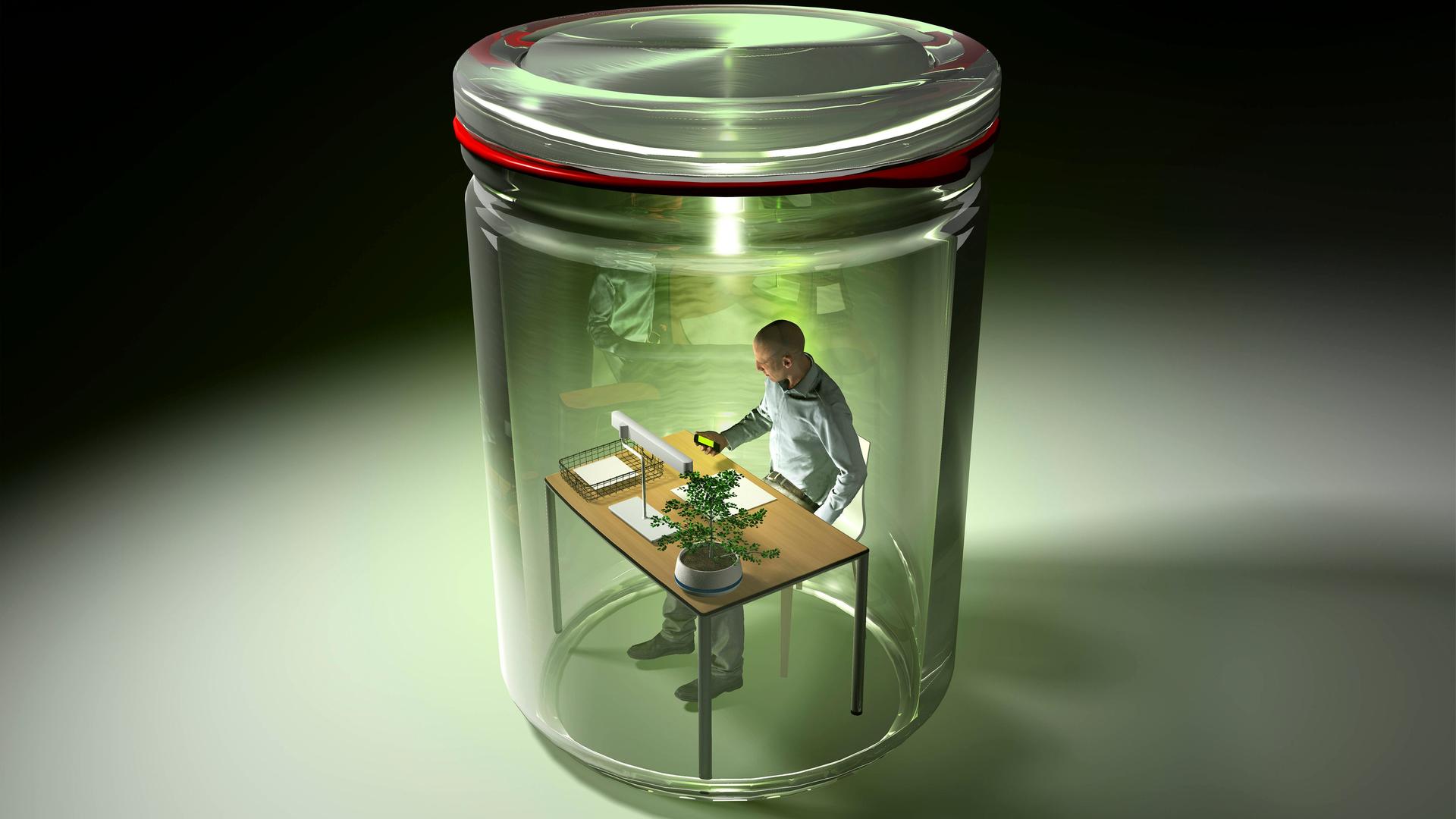 Fotomontage eines Mannes an einem Schreibtisch, eingesperrt in einem Einmachglas.