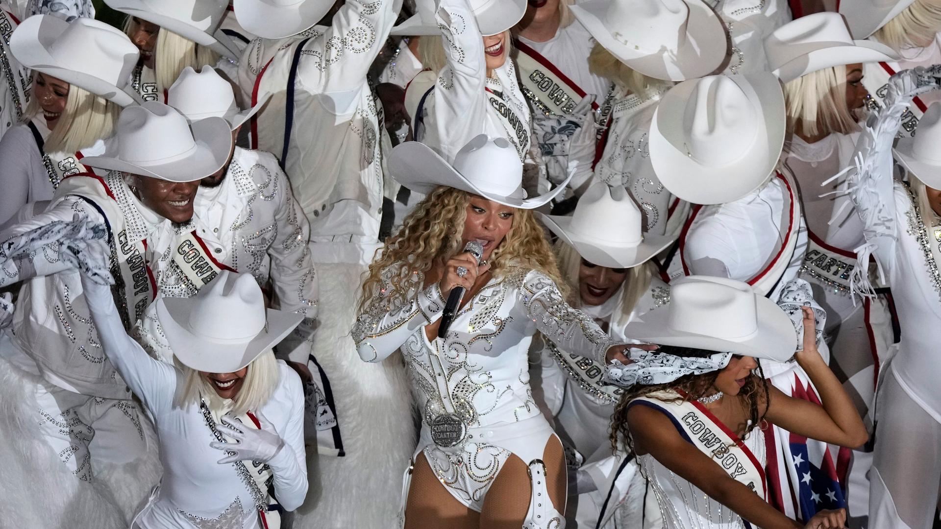 Beyoncé performs during halftime of an NFL football game between the Houston Texans and the Baltimore Ravens, Wednesday, Dec. 25, 2024, in Houston. (AP Photo/Eric Christian Smith) Beyoncé performs during halftime of an NFL football game between the Houston Texans and the Baltimore Ravens, Wednesday, Dec. 25, 2024, in Houston. (AP Photo/Eric Christian Smith)