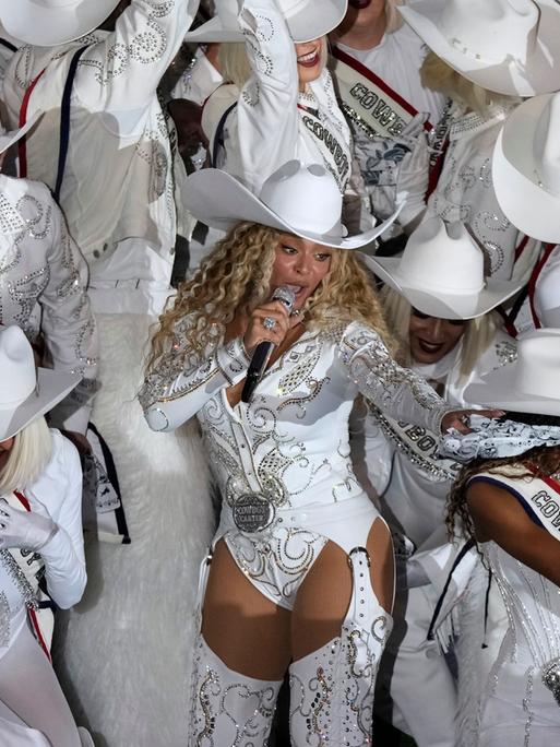 Beyoncé performs during halftime of an NFL football game between the Houston Texans and the Baltimore Ravens, Wednesday, Dec. 25, 2024, in Houston. (AP Photo/Eric Christian Smith)