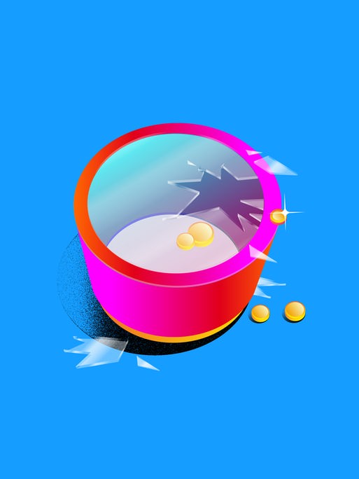 Ein roter Behälter mit mehreren Goldstücken