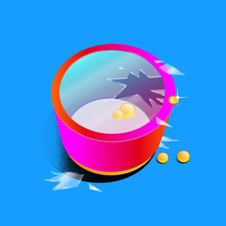 Ein roter Behälter mit mehreren Goldstücken