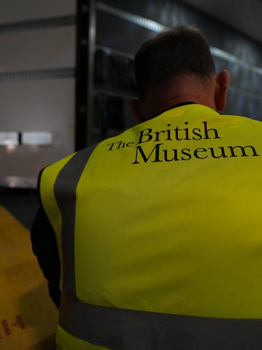 A British Museum worker unloads objects from a truck at the British Museum in London, Friday, July 10, 2026. (AP Photo/Kwiyeon Ha)