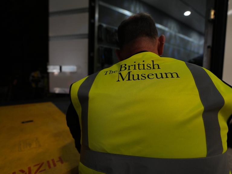 A British Museum worker unloads objects from a truck at the British Museum in London, Friday, July 10, 2026. (AP Photo/Kwiyeon Ha)