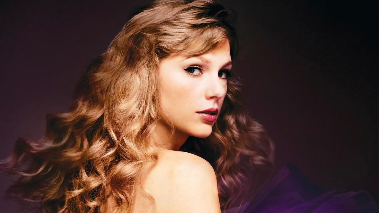 Das Albumcover zeigt Taylor Swift im Porträt schräg von der Seite mit langen gelockten Haaren und freiem Rücken. Darunter lila Tüll.