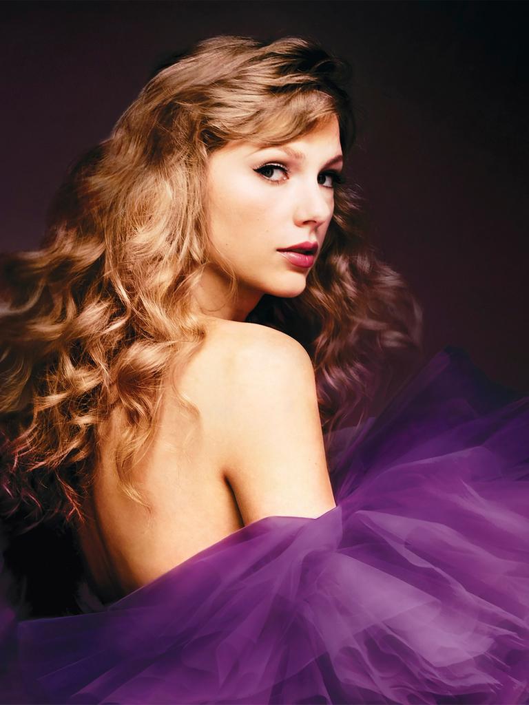 Das Albumcover zeigt Taylor Swift im Porträt schräg von der Seite mit langen gelockten Haaren und freiem Rücken. Darunter lila Tüll.