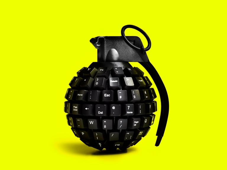 Illustration: Eine Granate die aus einem Computerkeyboard geformt ist.
