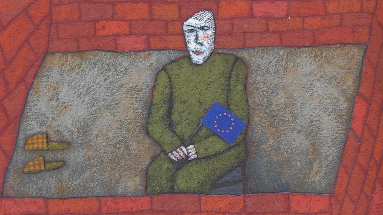 Eine Person sitzt mit einer Europaflagge hinter Mauern. (Illustration)