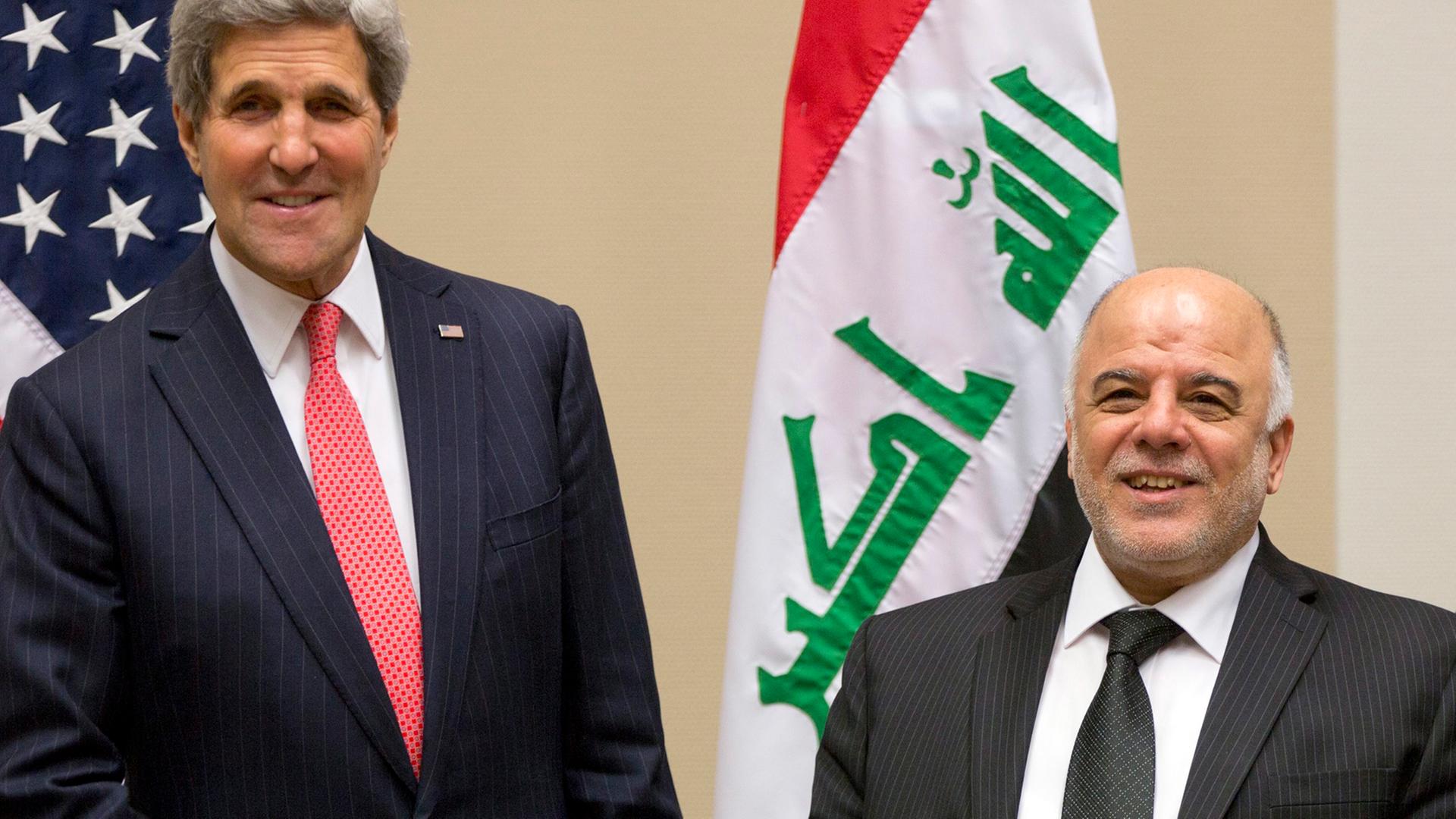 US-Außenminister Kerry und sein irakischer Kollege Al-Jaafari bei einem Treffen des Bündnisses gegen die Terrormiliz IS