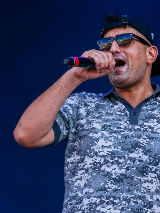 Rapper Aykut Anhan aka Haftbefehl performs during the second day of the Southside festival.
