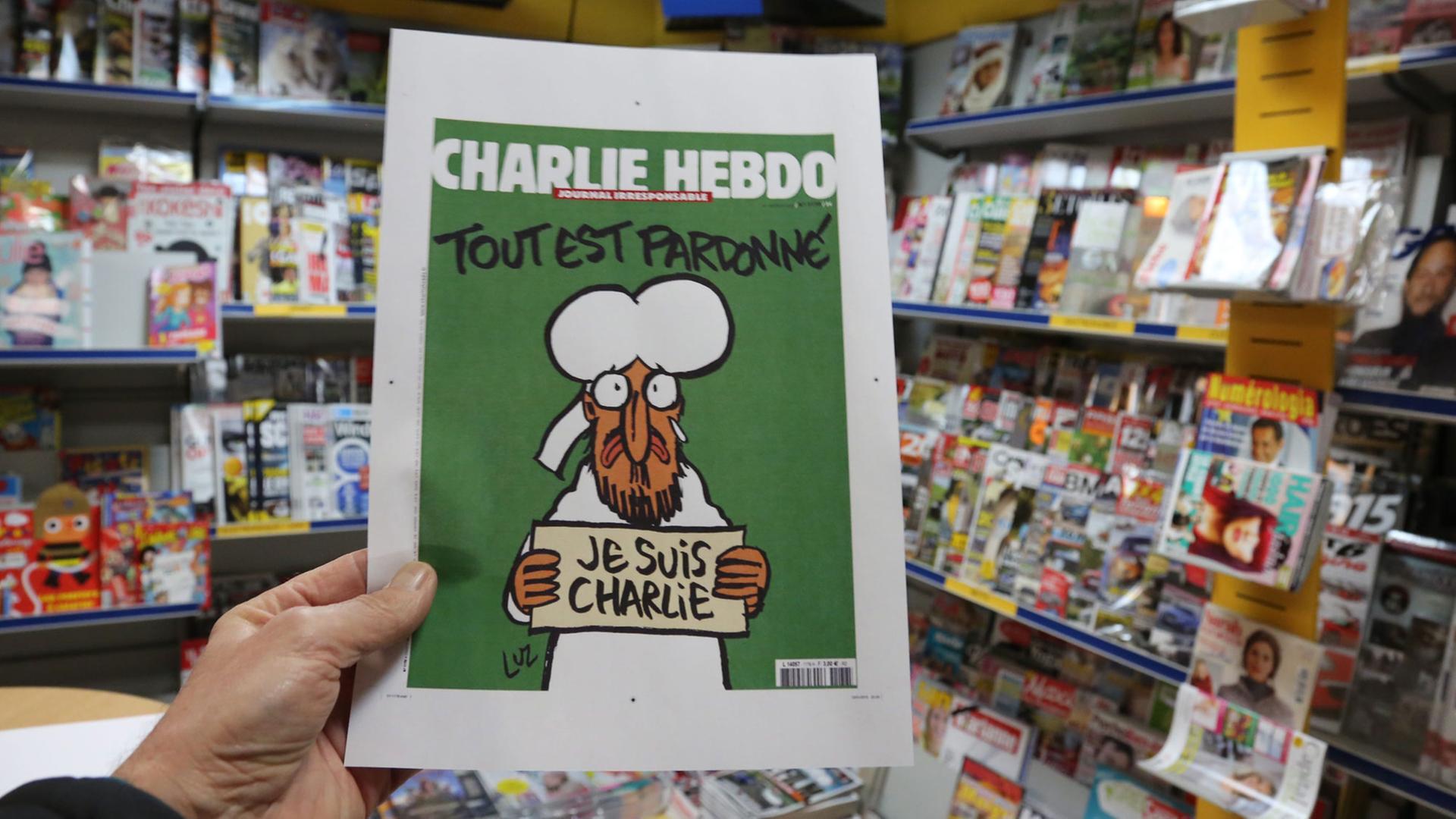 Ein Ausdruck des vorab veröffentlichten Titelbilds der Ausgabe des französischen Satiremagazins "Charlie Hebdo" vom 14. Januar 2015